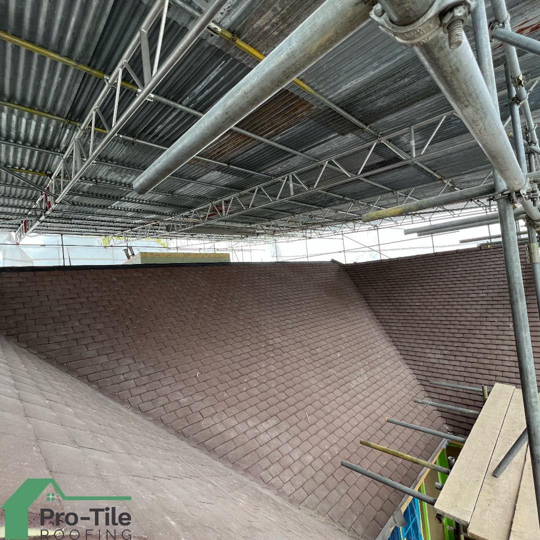 Newly tiled hipped roof close-up