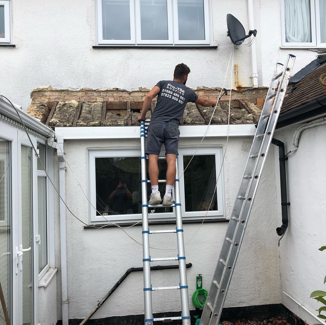 Roof repair from ladder