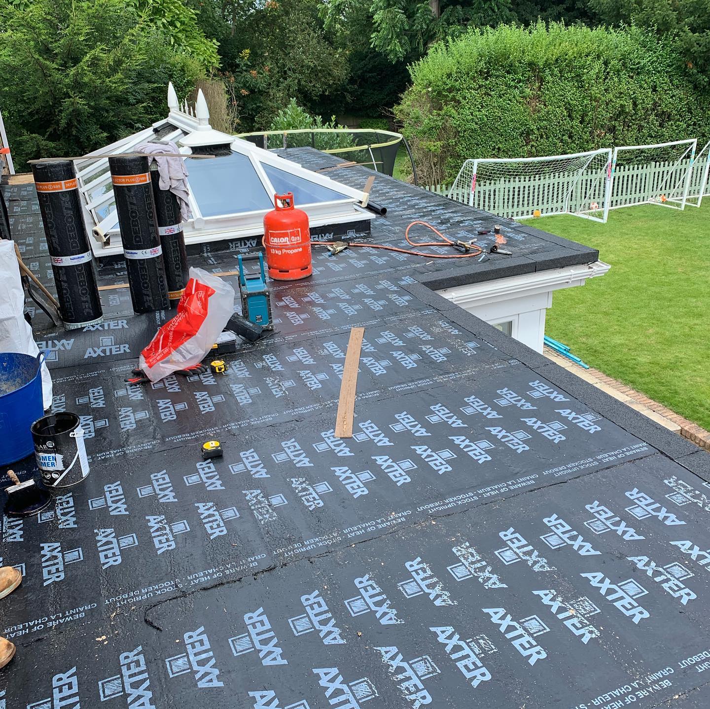 Flat roof felt system installation